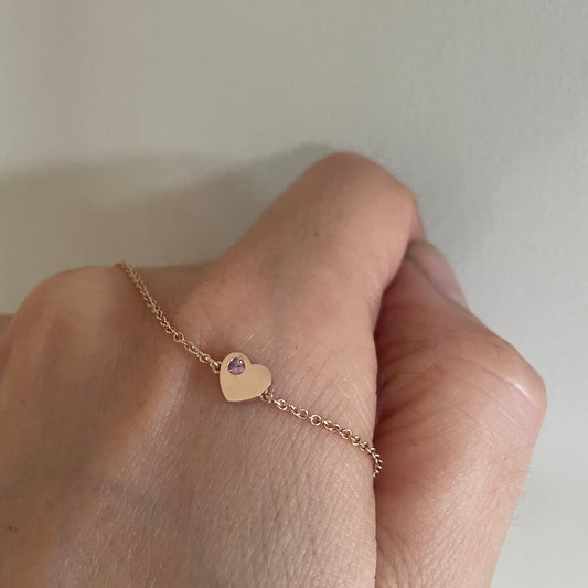 pink stone set gold heart bracelet 
