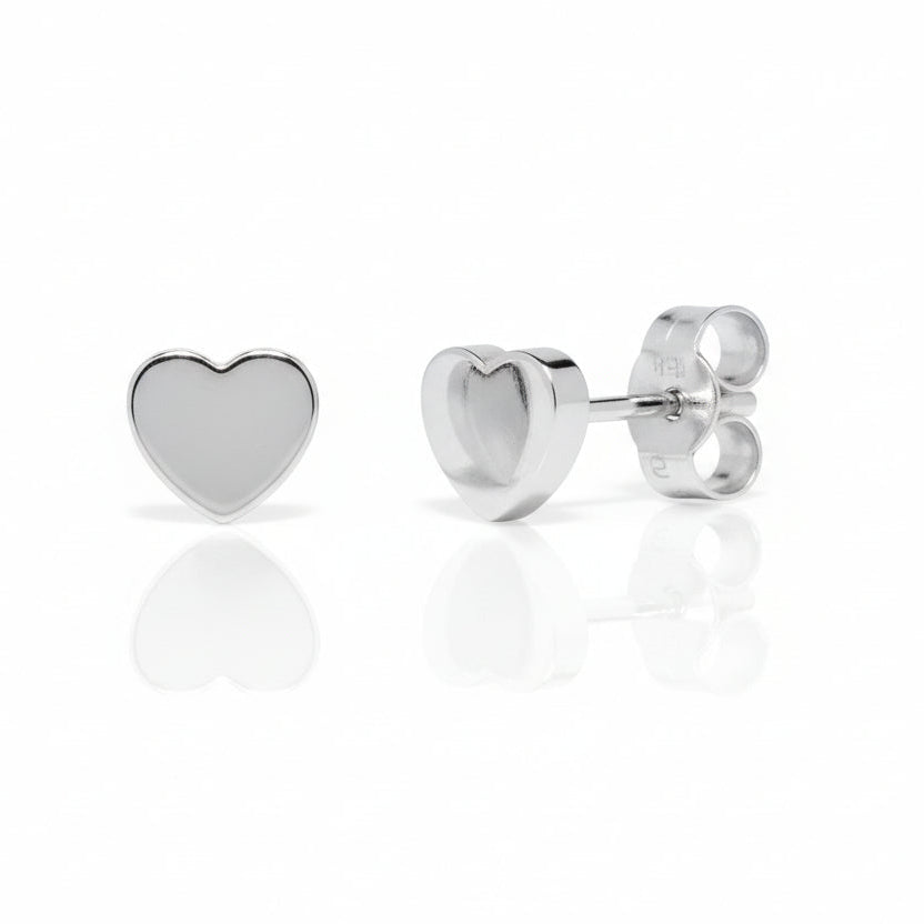 pair of slver heart shaped stud earrings